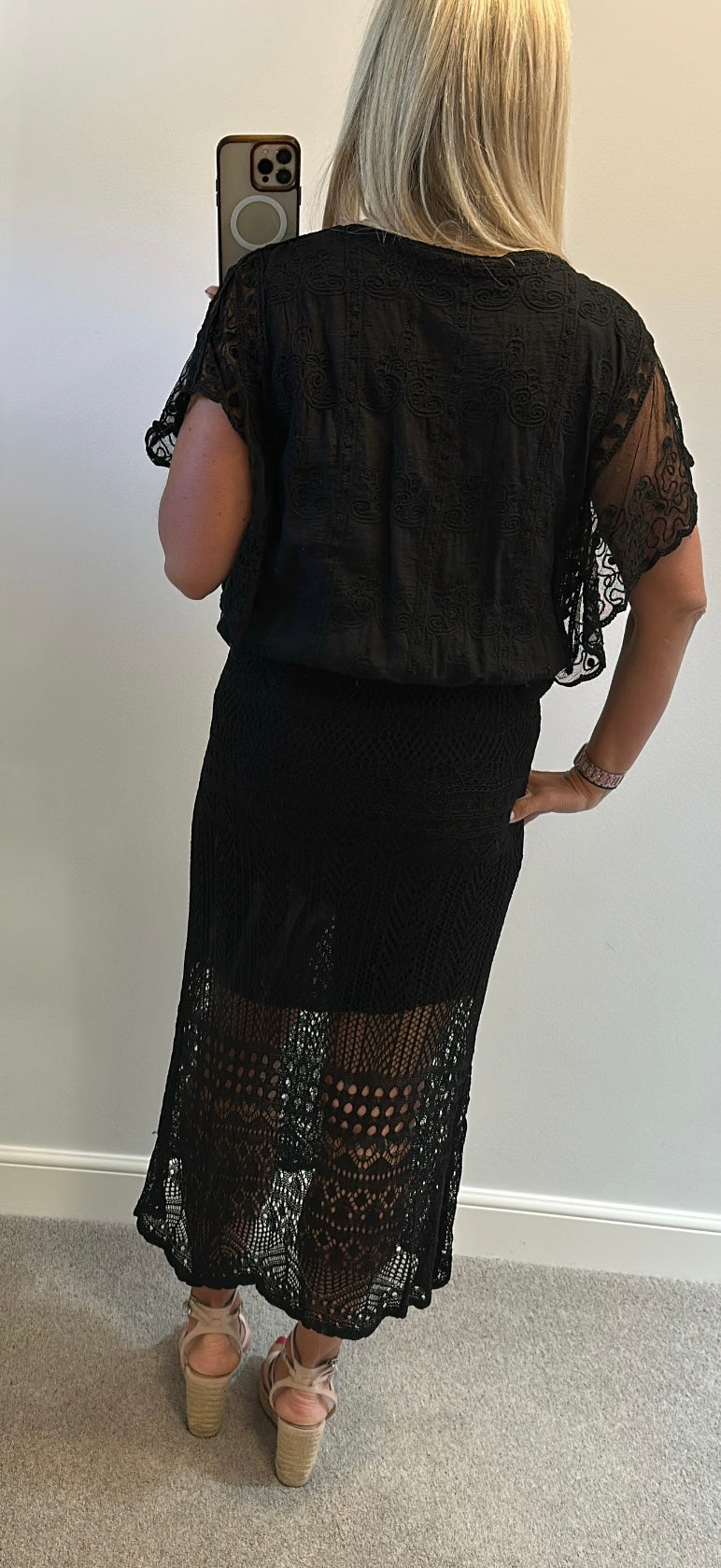Black lace skirt size L would fit upto size 14