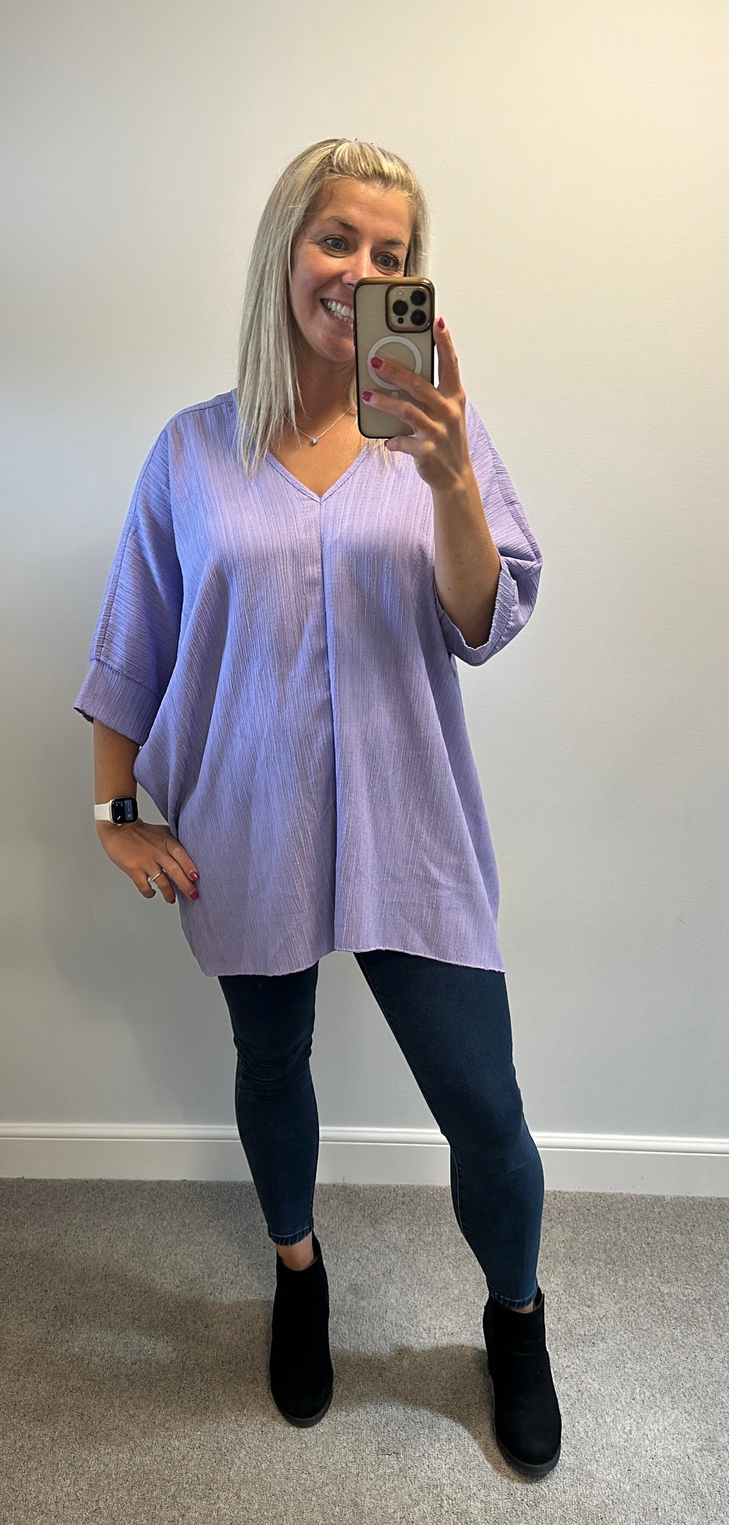 Lilac top one size would fit up to size 24