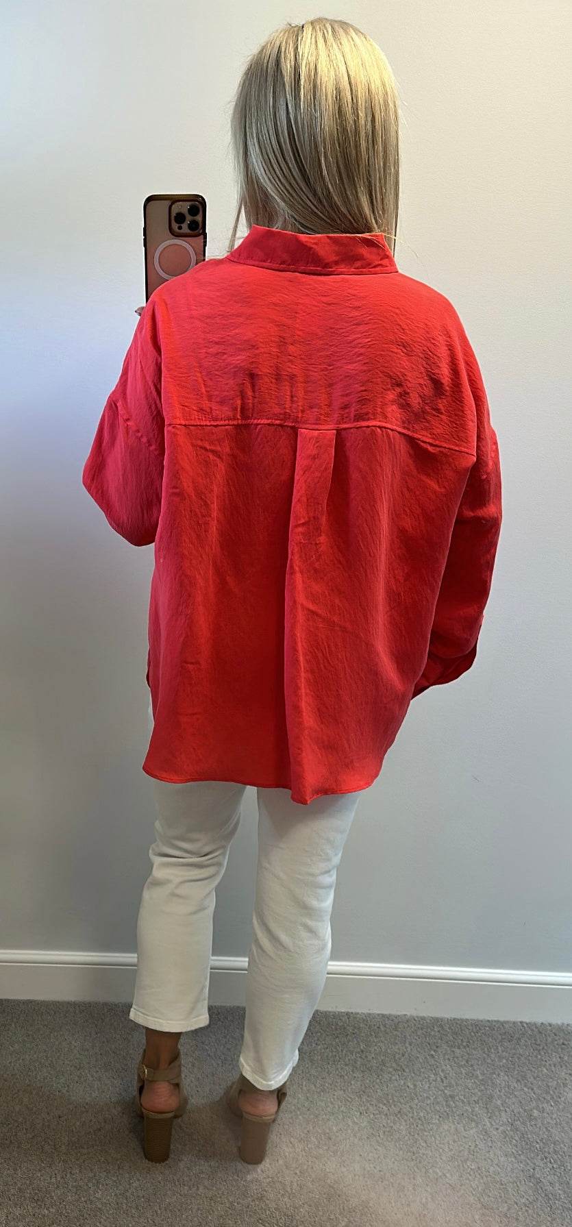 Zara coral / red shirt size XL would fit upto size 18