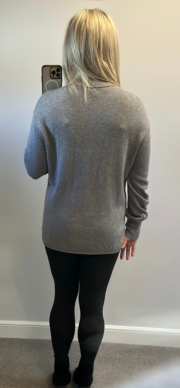 Grey knit jumper would fit upto size 18