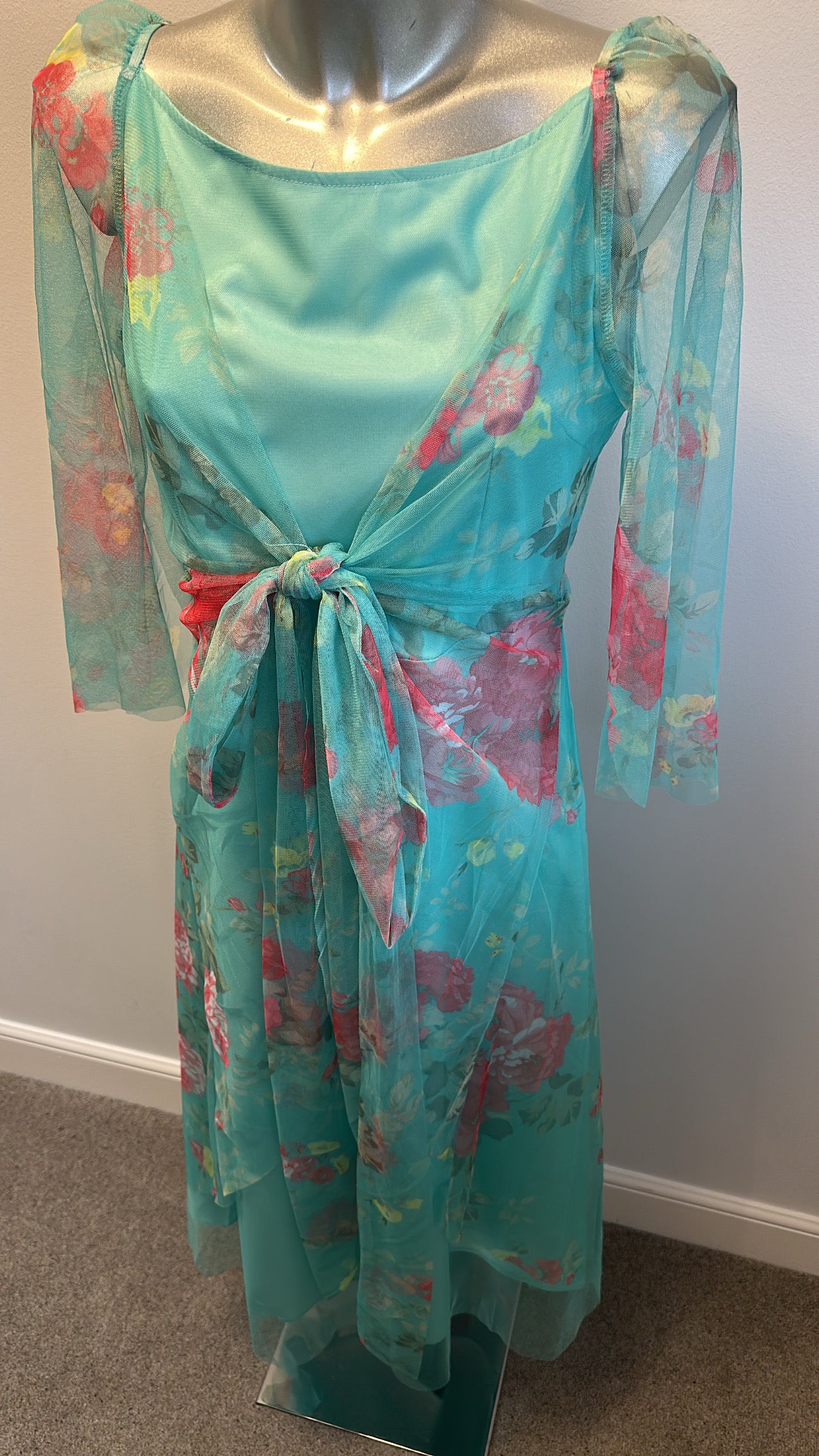 Turquoise floral dress size M would fit upto size 12