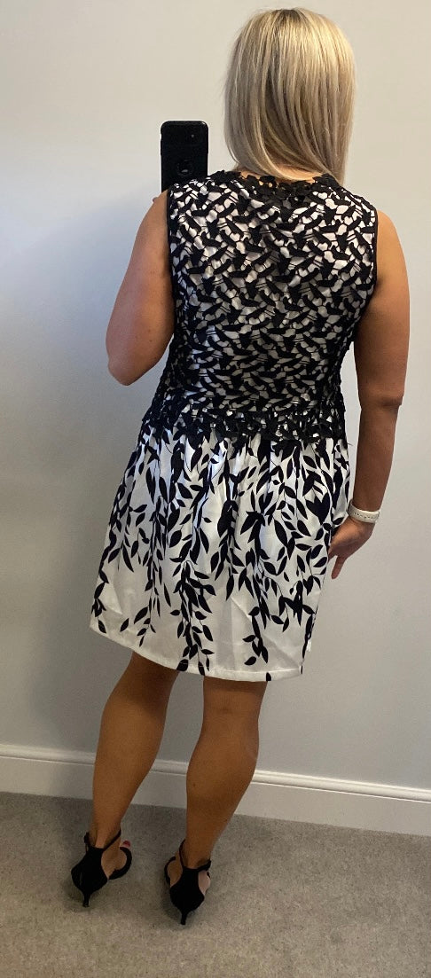 White and black lace dress brand new with tags size XL fitting upto size 14