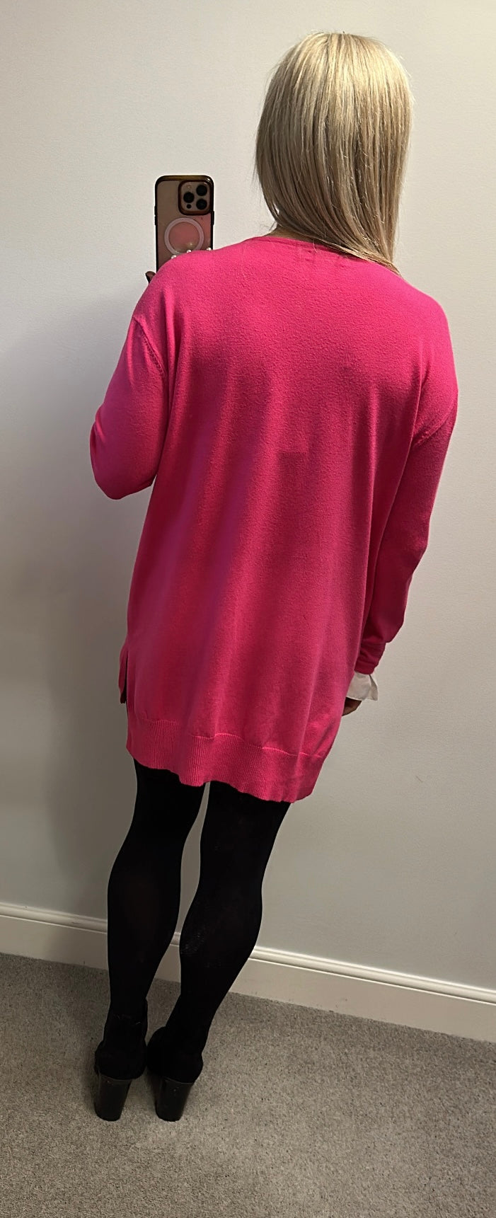 Laetitia Mem pink knit top with pearl v-neck embellishments and white ruffled cuff details one size fitting upto size 18