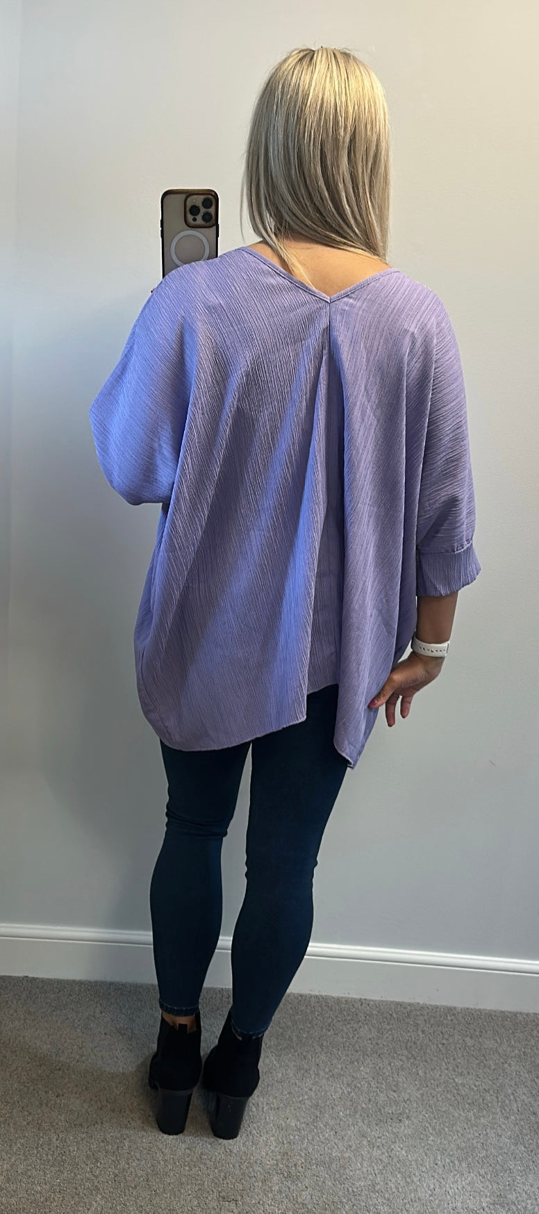 Lilac top one size would fit up to size 24