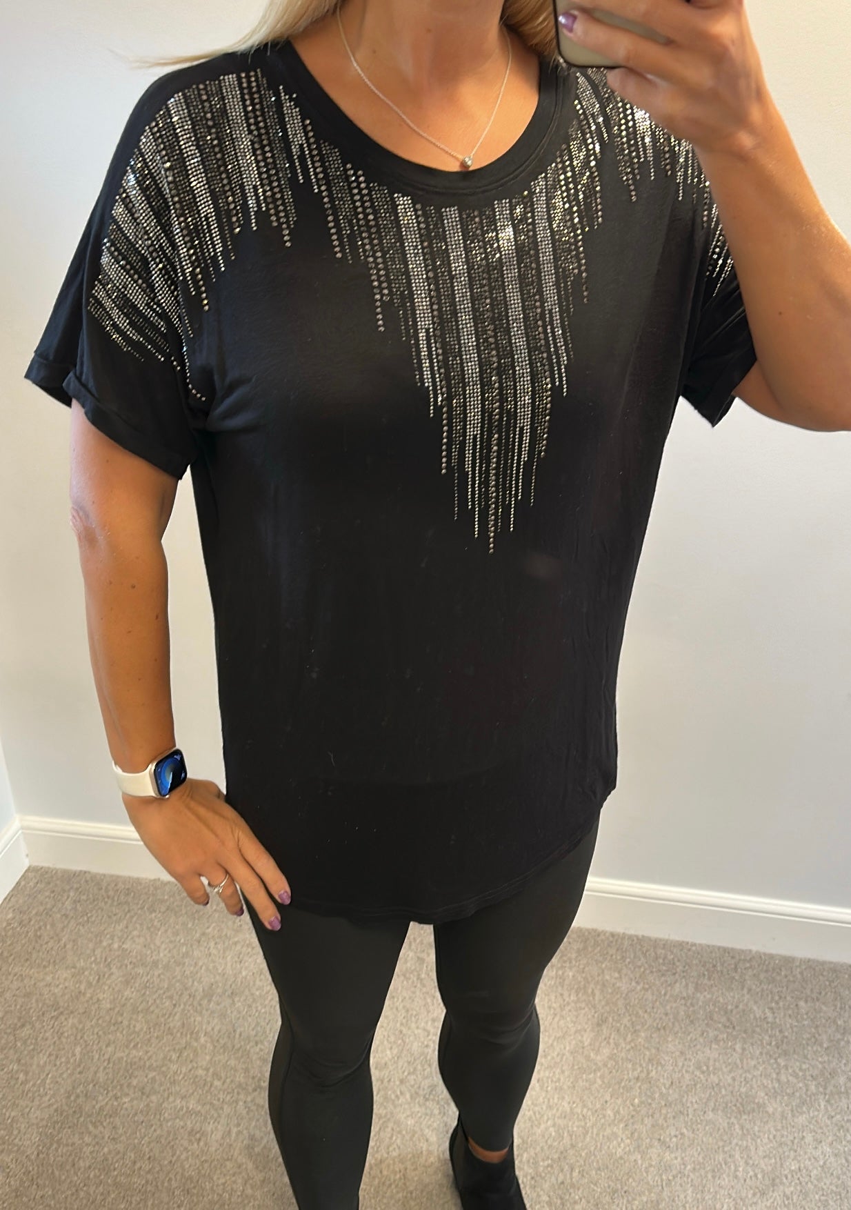 Misumi black embellished tshirt would fit upto size 16