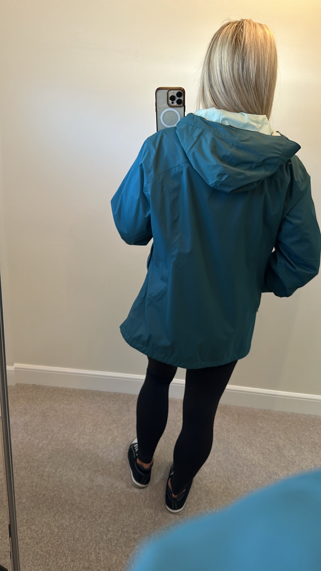 Jack Wolfskin rain jacket size XL would fit upto size 18