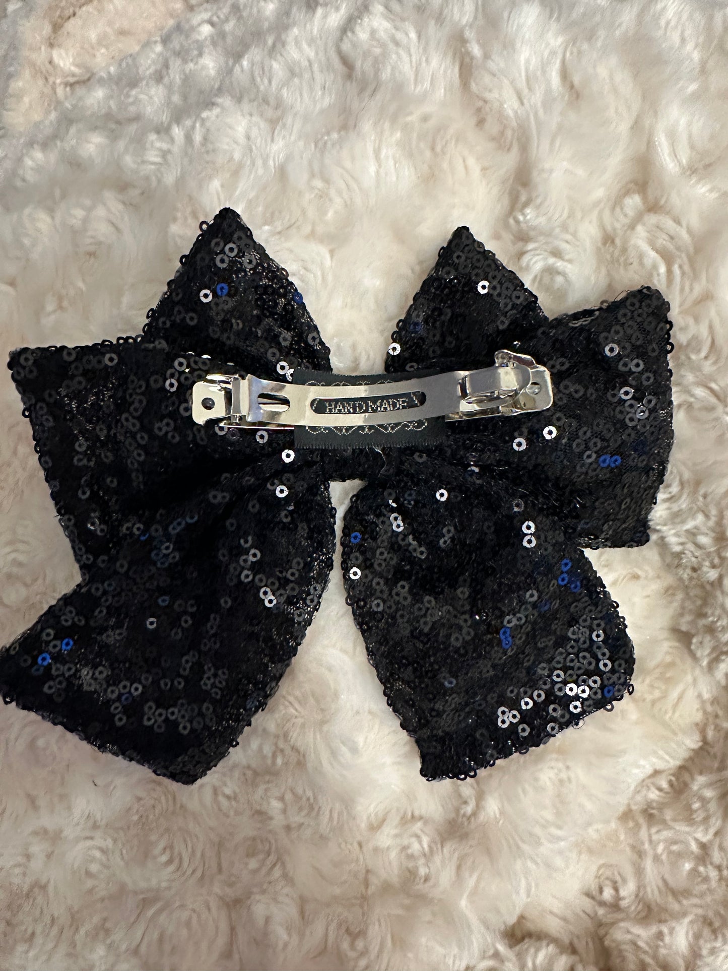Brand new black sequin bow hair clip / brooch