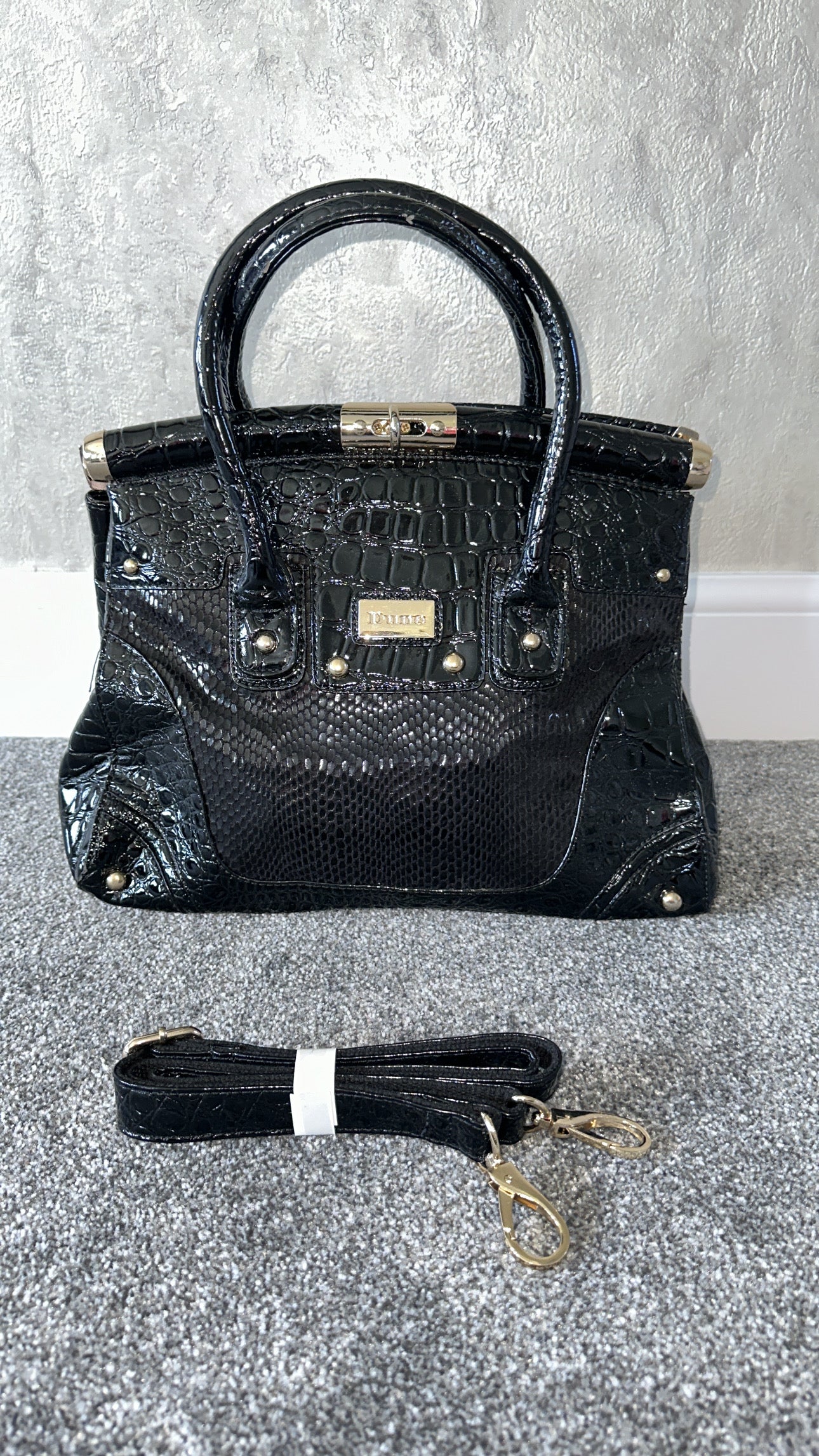 Dune black crocodile effect patent handbag