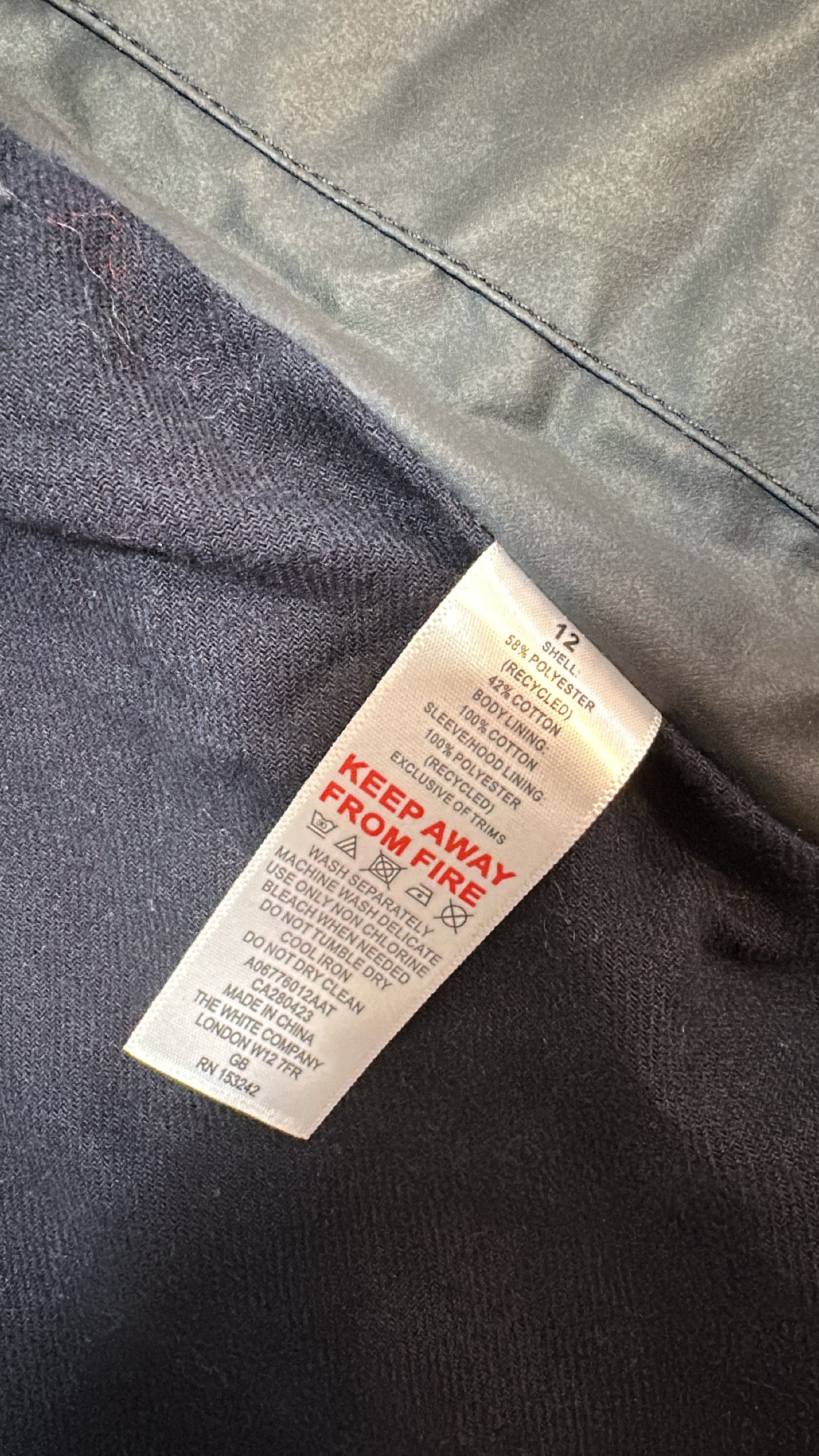 White stuff navy jacket with pack away hood size 12