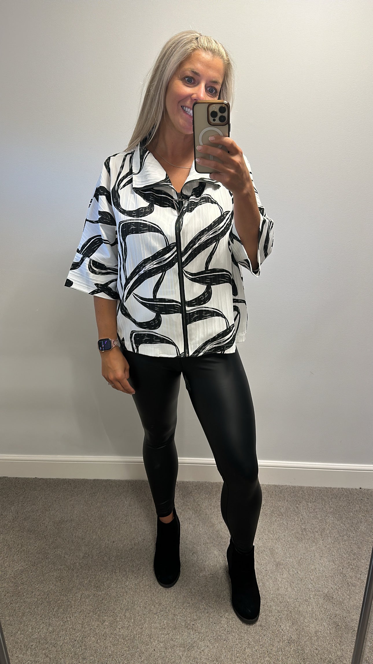 Malissa J white and black print zip top would fit upto size 18