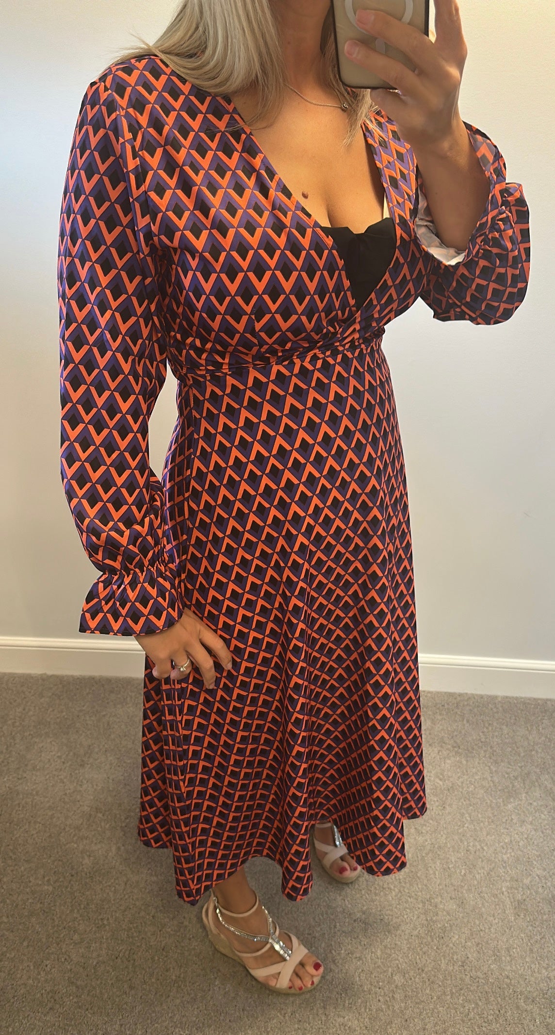 Orange and purple print dress would fit up to size 12