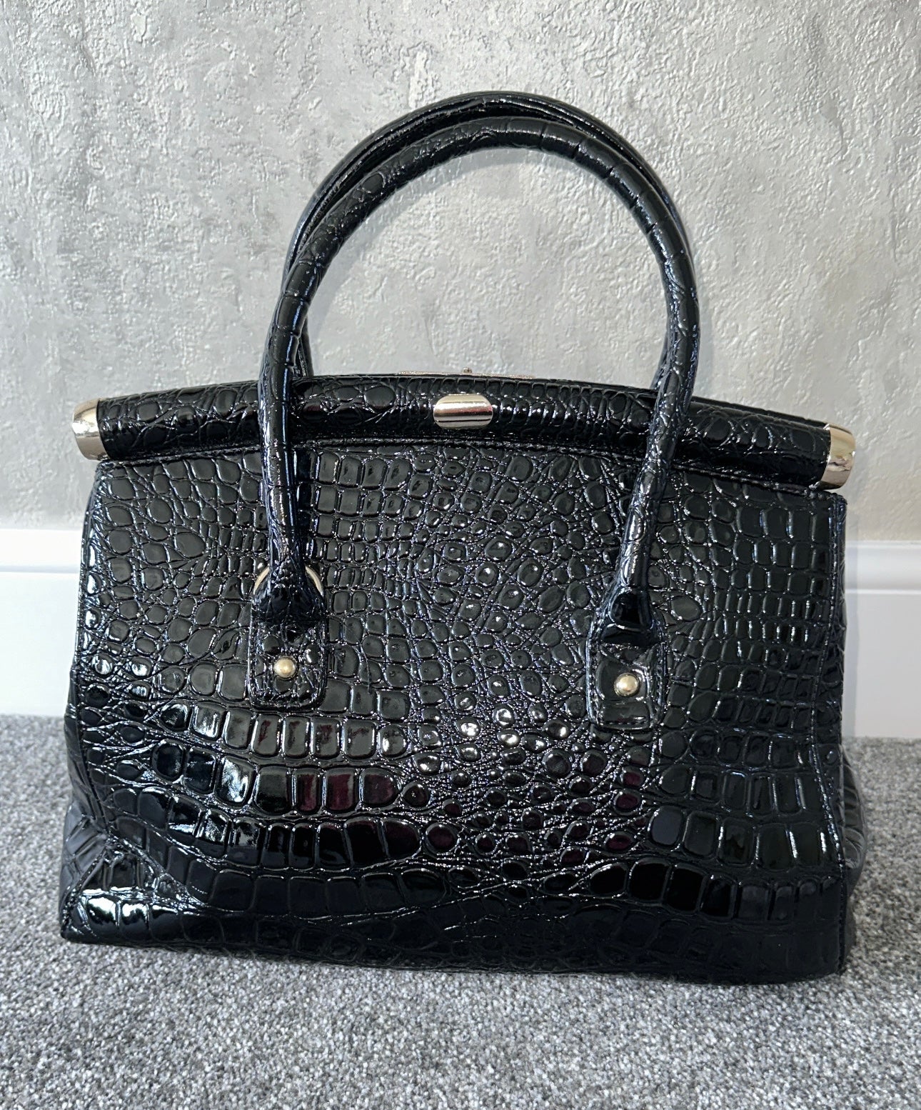 Dune black crocodile effect patent handbag