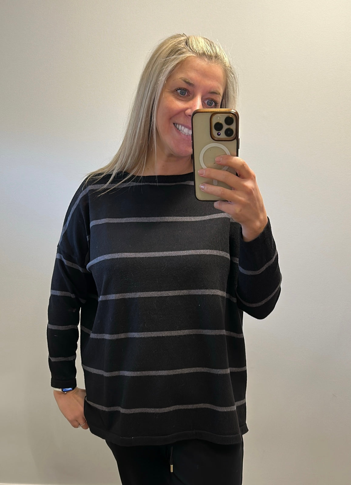 “Amazing” black and grey stripe knit jumper one size fitting upto size 18