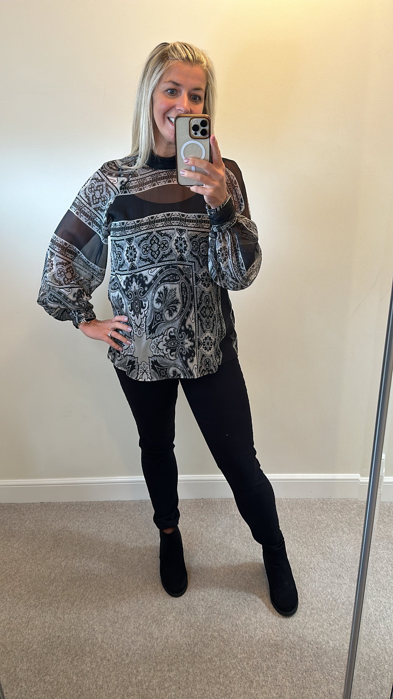 Mango black paisley print blouse would fit upto size 16