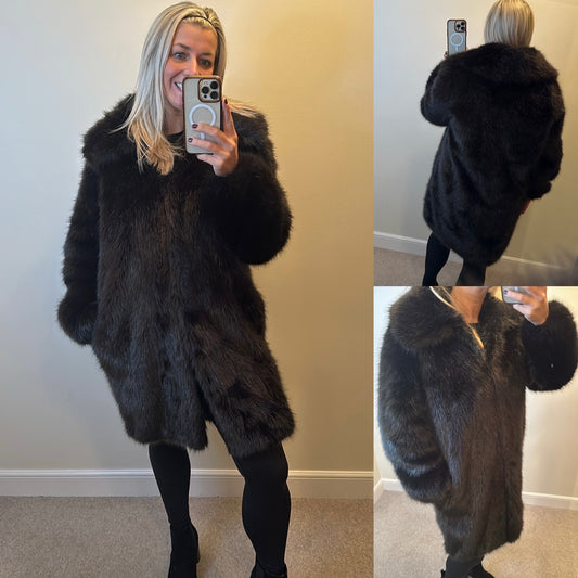 Michael Kors black faux fur coat would fit upto size 18 brand new with tags