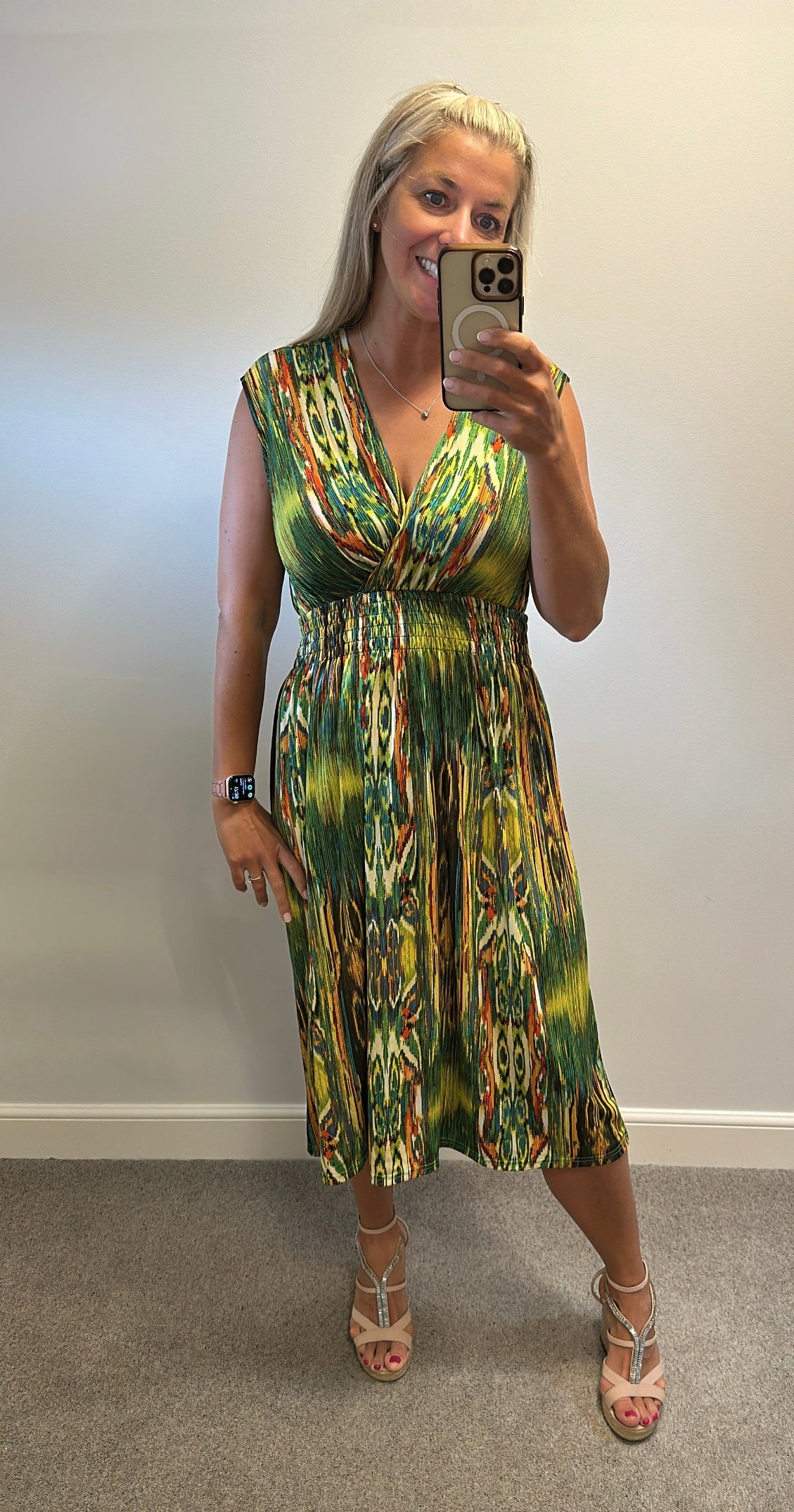 Green multi coloured dress one size fitting upto size 14