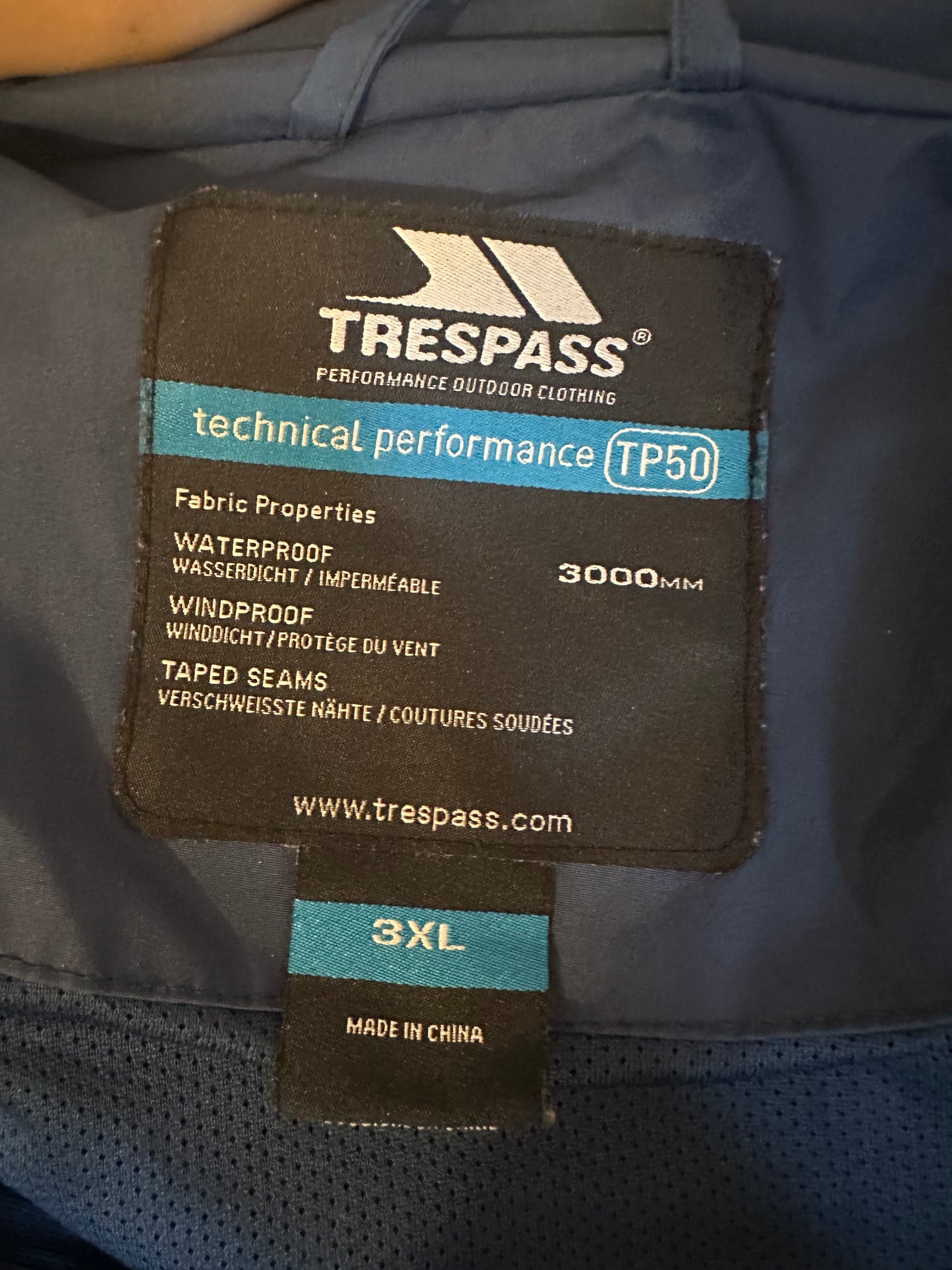 Trespass waterproof navy rain jacket fit upto size 20