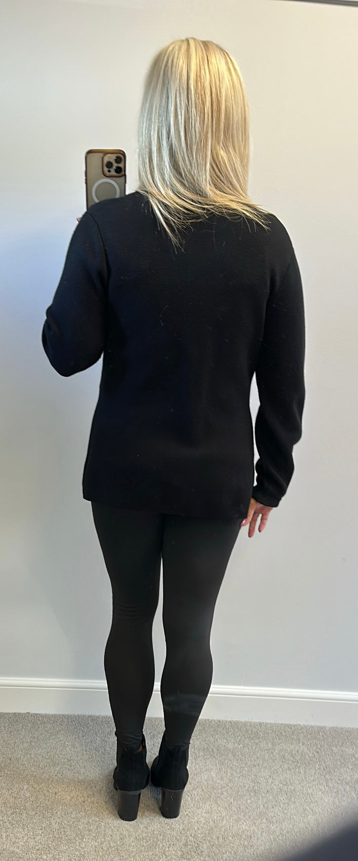 Cristina black top size L/XL would fit upto size 16