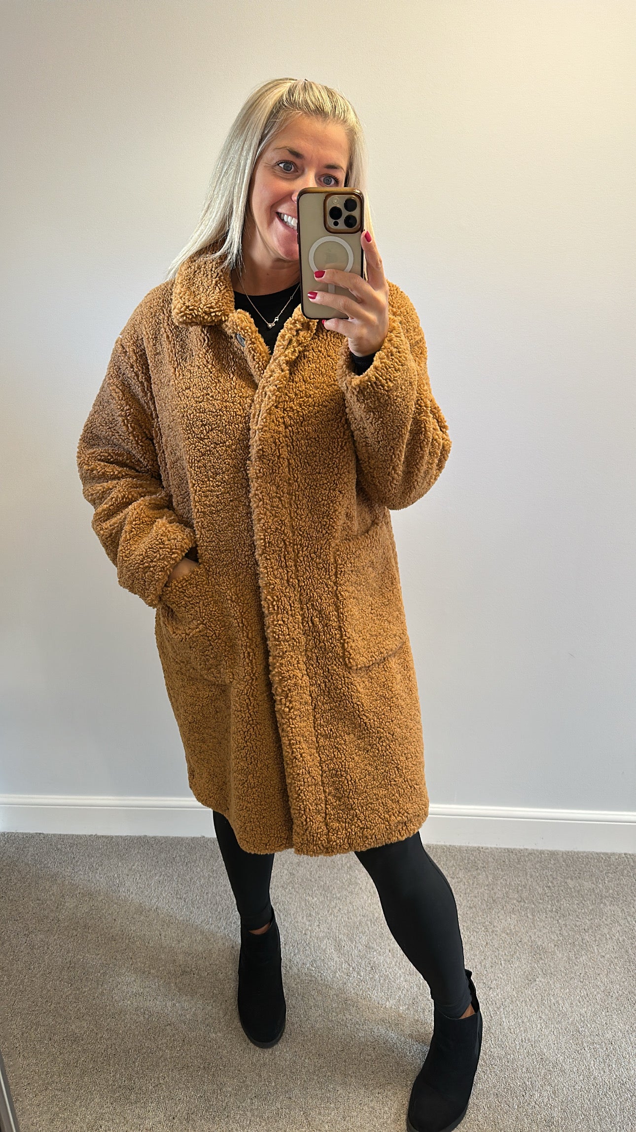 John Lewis any day brown teddy coat size L would fit upto size 14