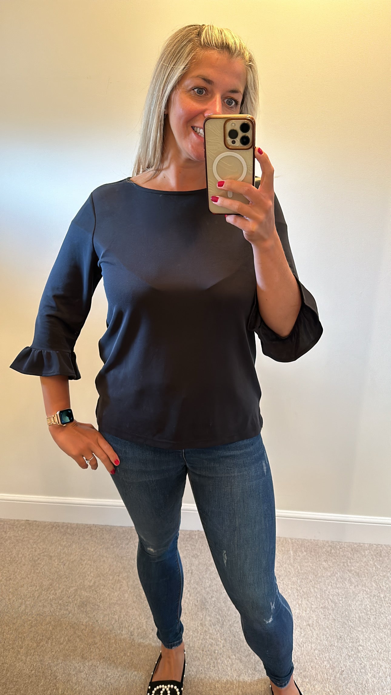 Peppercorn black top size L would fit upto size 14