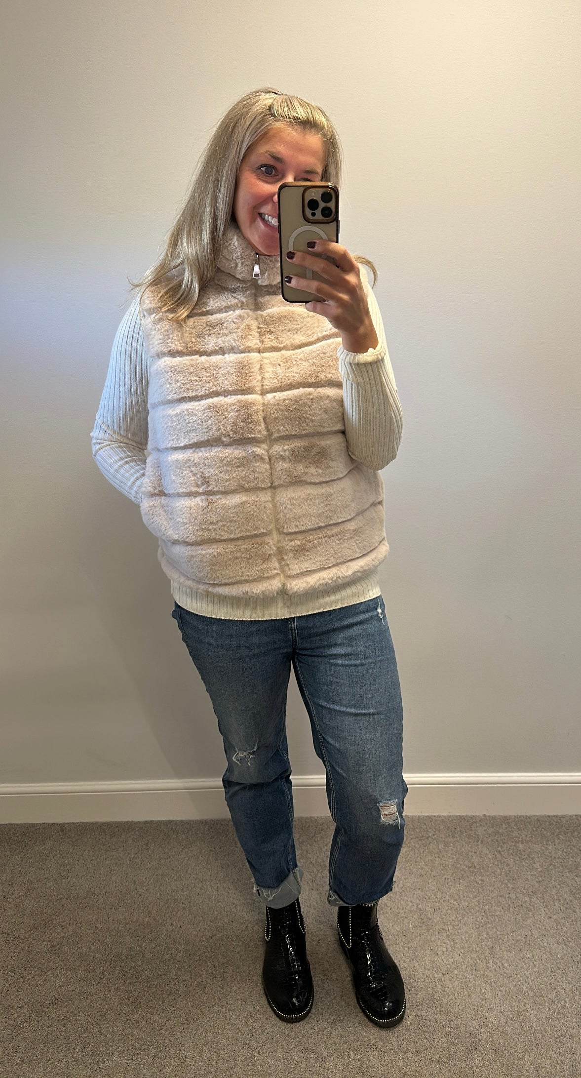 Cream faux fur gilet with zip front would fit upto size 12