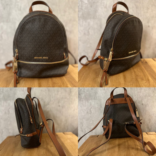 Michael Kors “Rhea” leather backpack