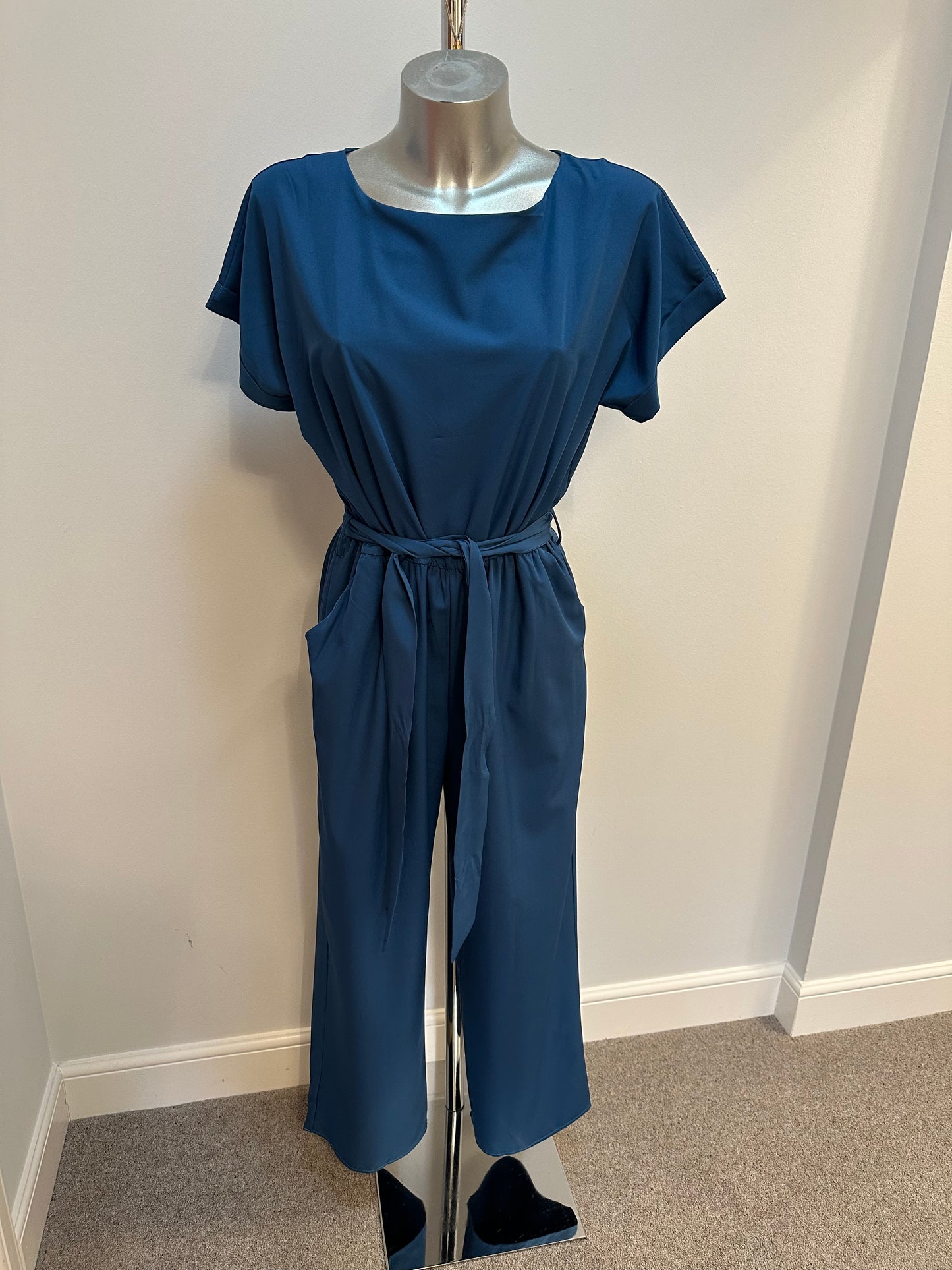 Teal Green jumpsuit with pockets onesize fitting upto size 12