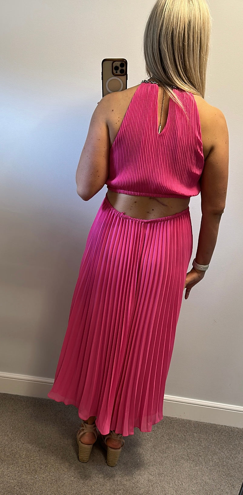 Michael Kors Pleated Cutout Dress in fuchsia pink with a chain-link halter neckline size M fitting upto size 14