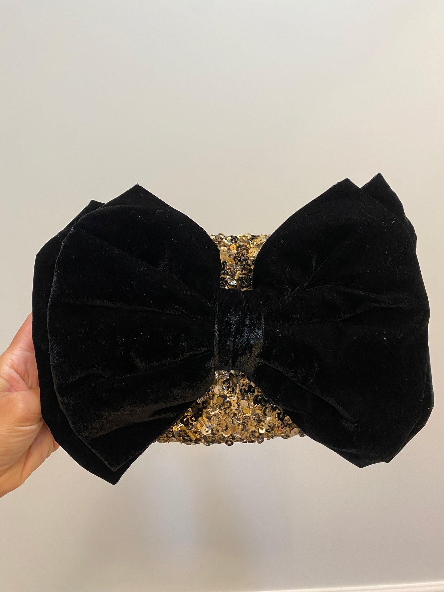 Monsoon gold sequin black bow clutch bag with strap