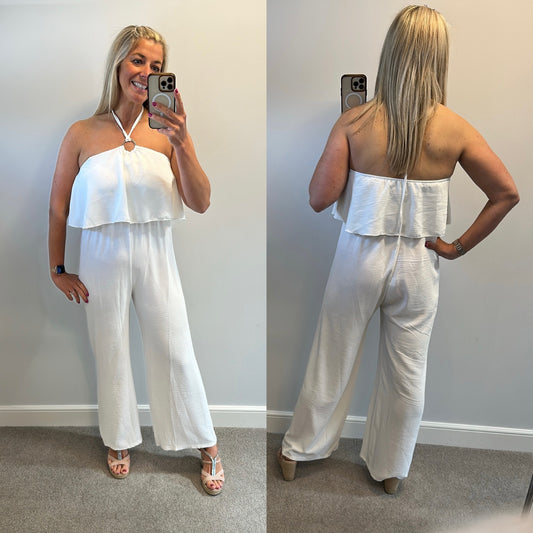 White jumpsuit would fit up to size 14 brand new without tags