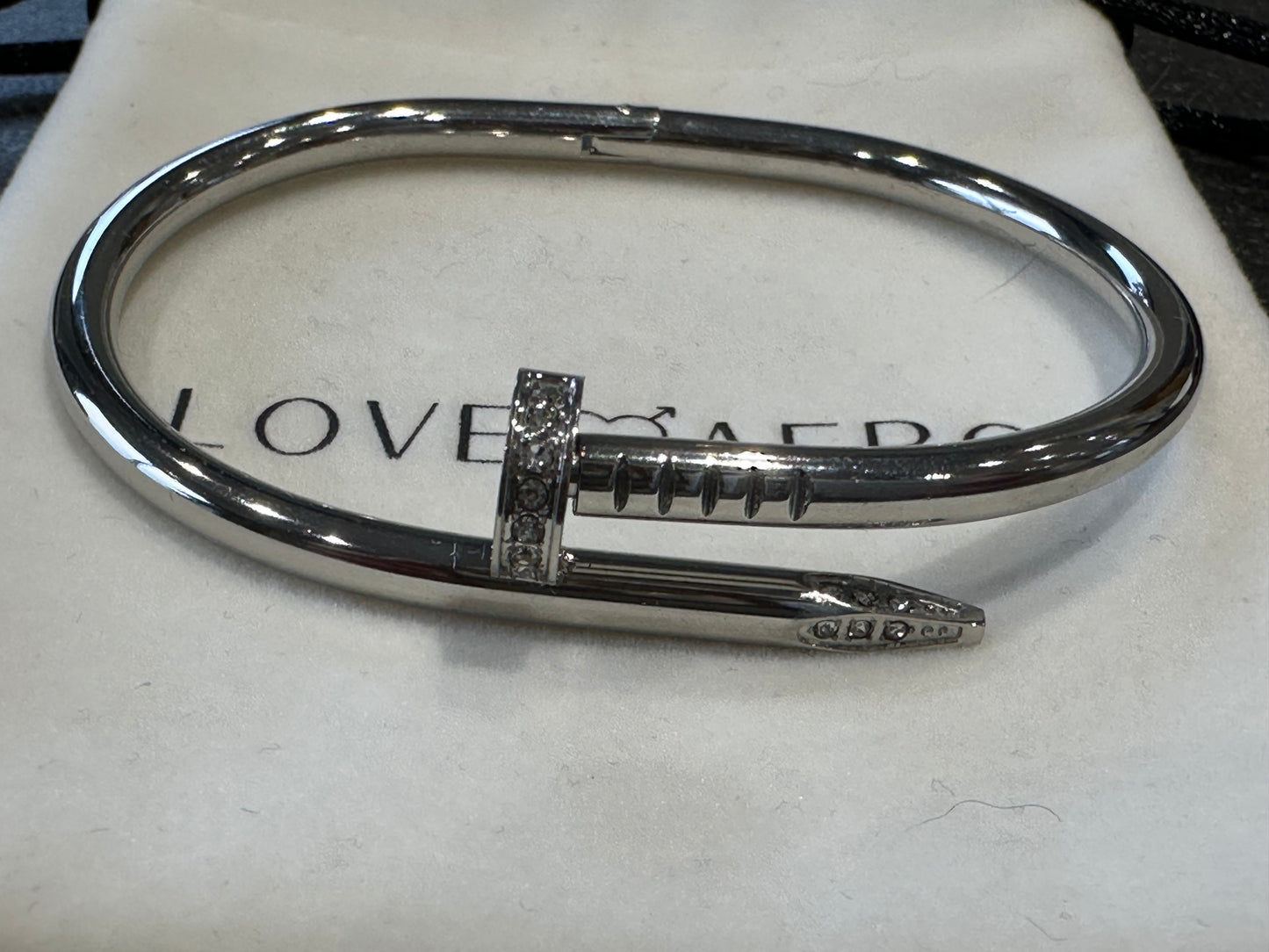 Love aero nail cuff rhinestone silver bracelet brand new without tags