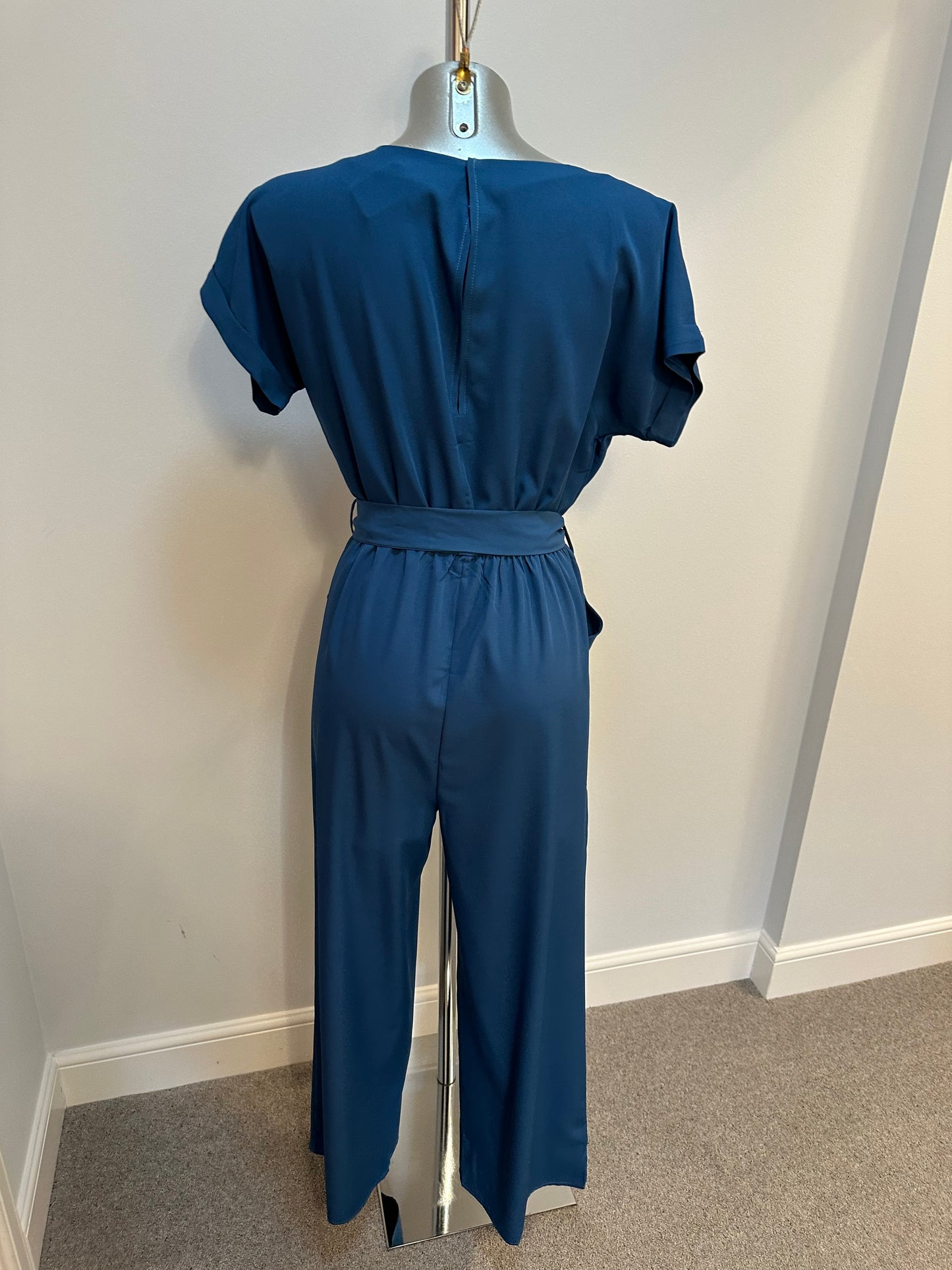Teal Green jumpsuit with pockets onesize fitting upto size 12