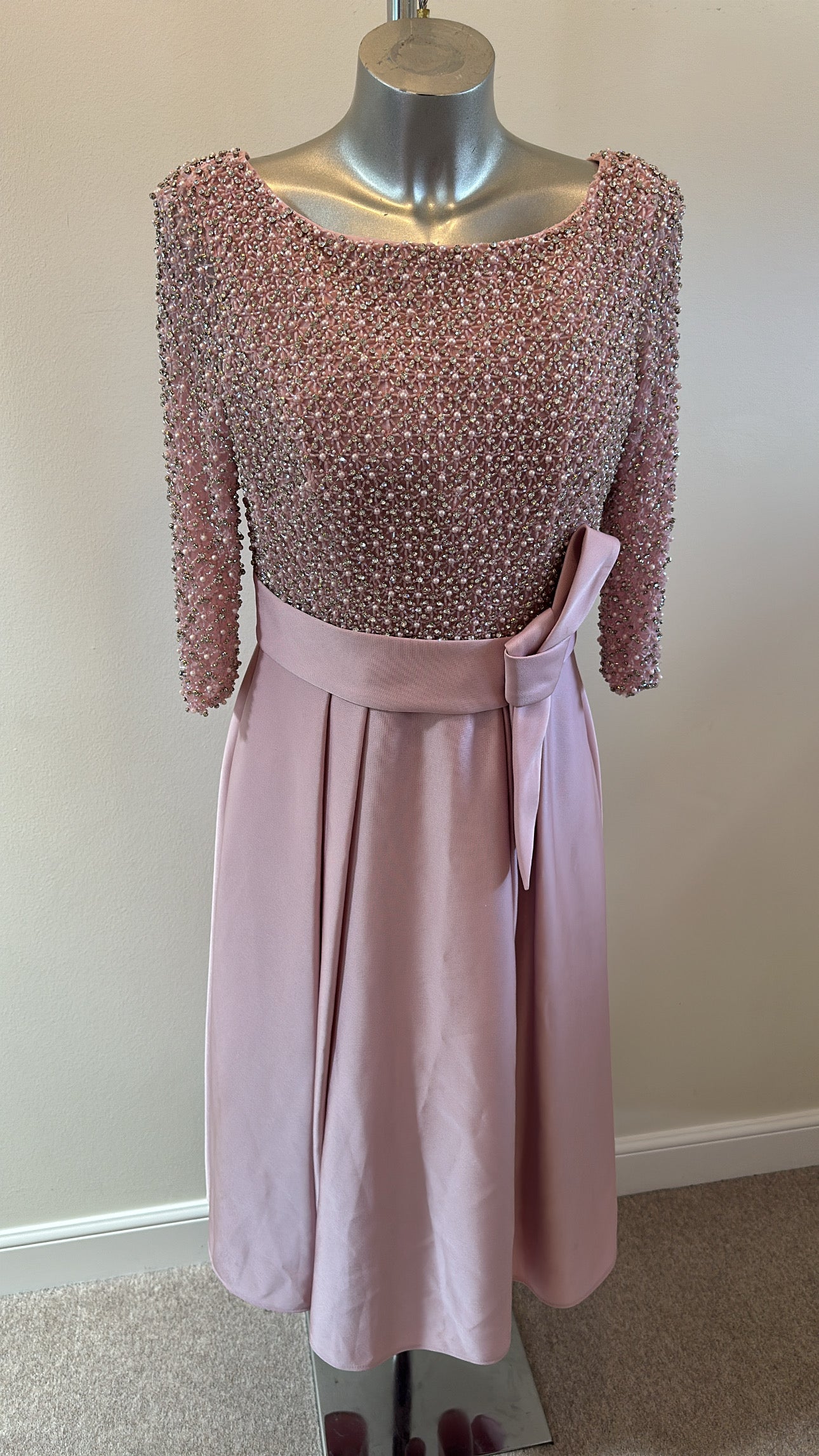 Veni Infantino blush pearl bodice with ¾ length sleeves and a bow belt detail size 12