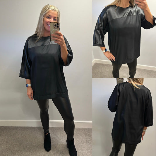 Black top size XL would fit upto size 18