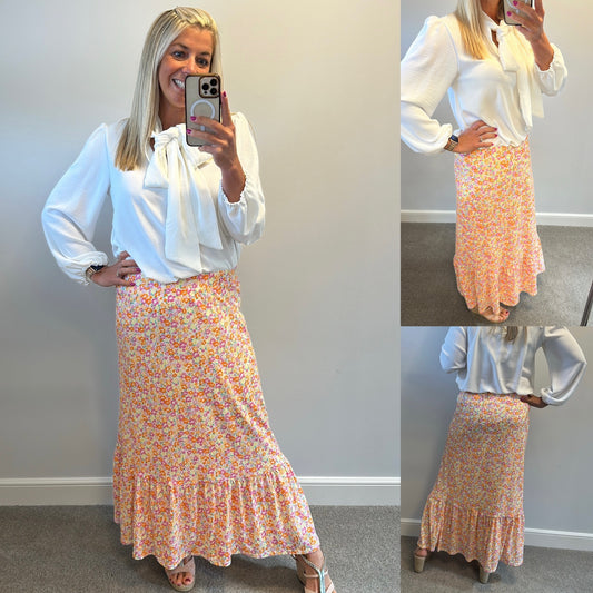 Only orange floral skirt one size fitting up to size 14