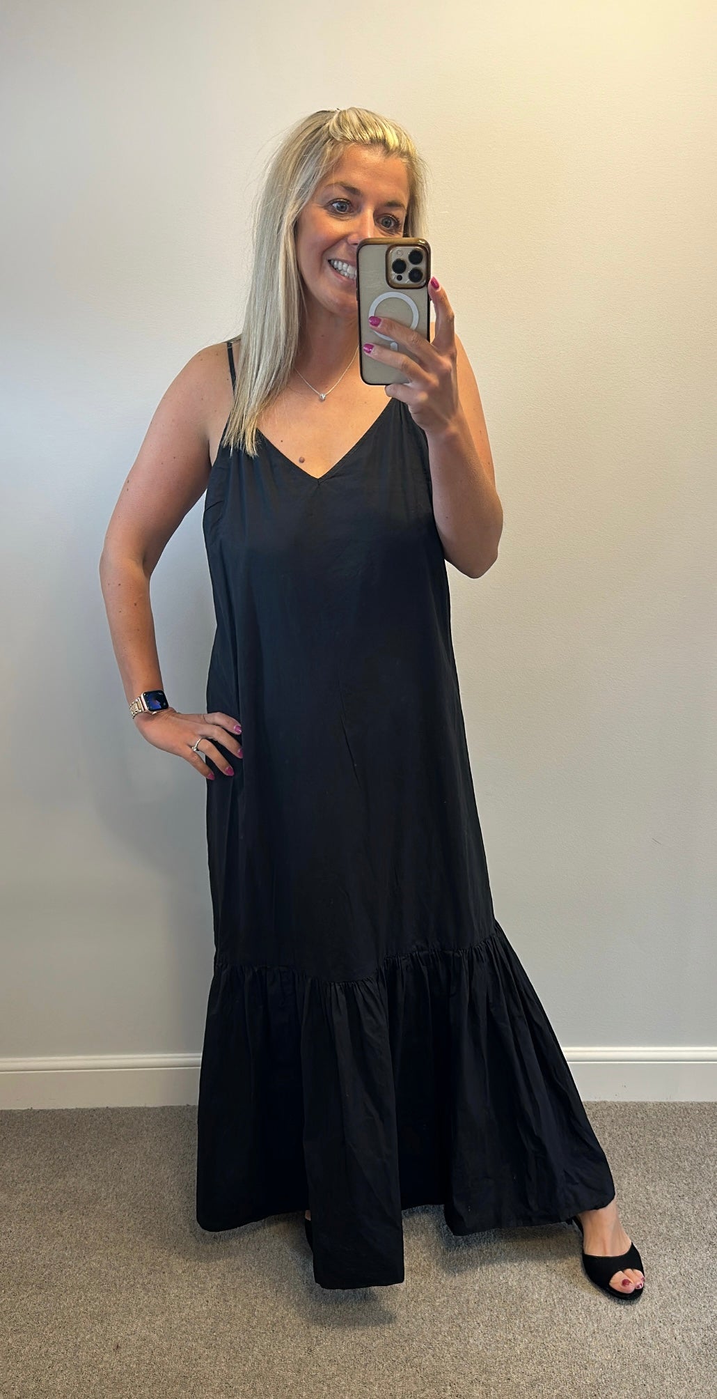 Michael Kors black strappy dress would fit up to size 16