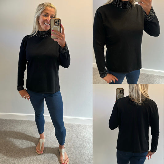 CasaMia exclusive black gem polo top size large would fit 14-16