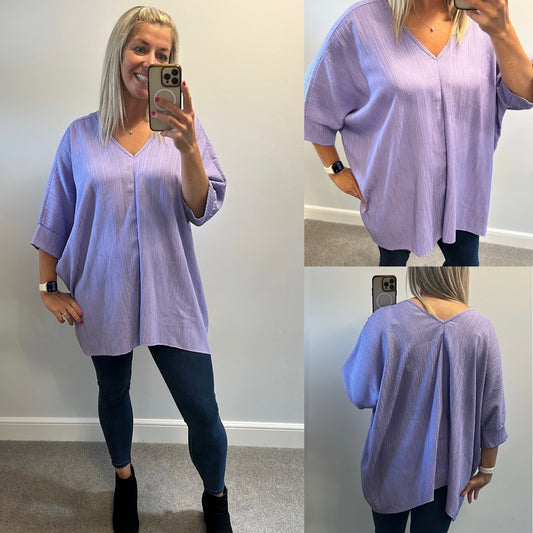 Lilac top one size would fit up to size 24