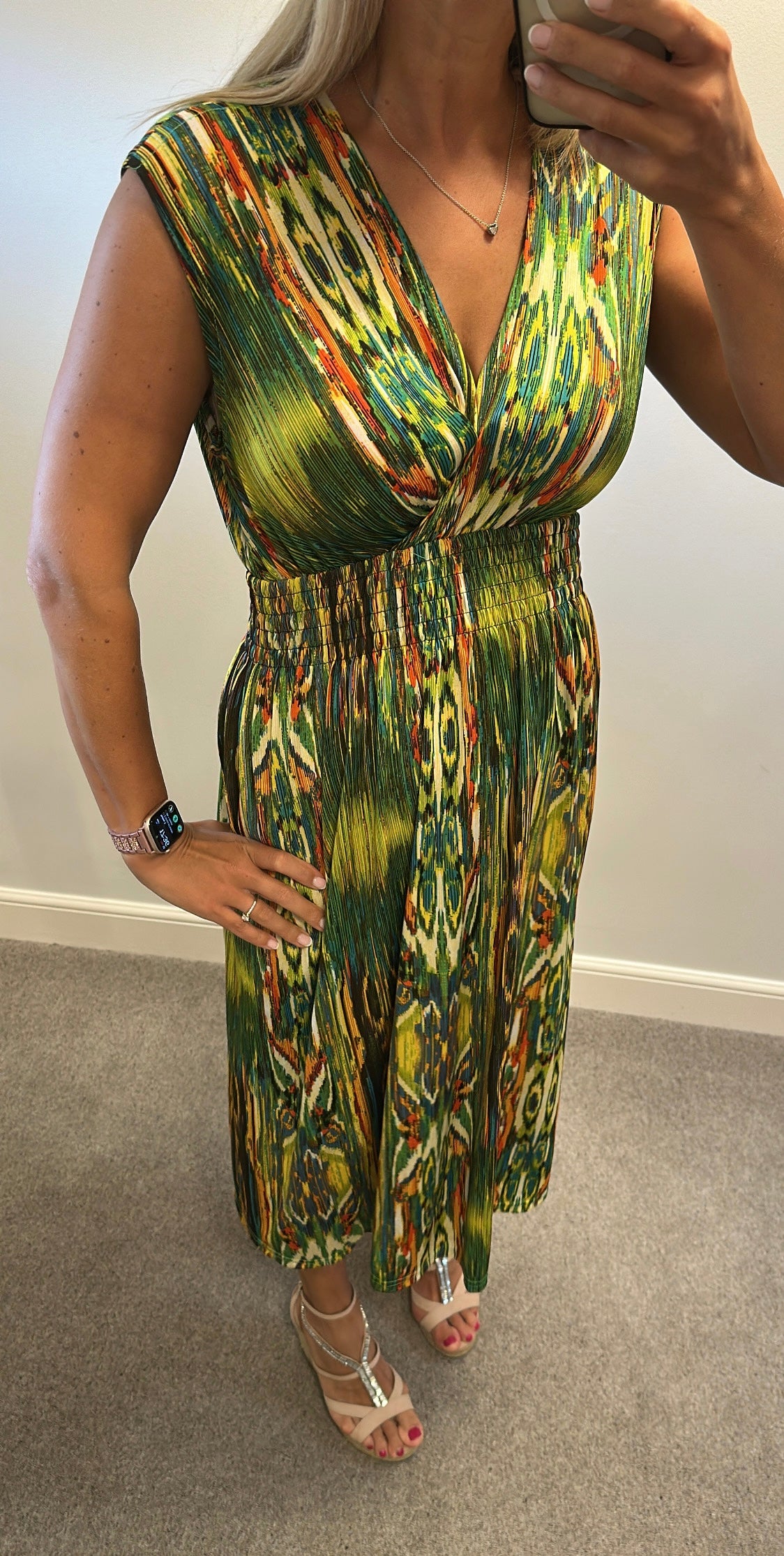 Green multi coloured dress one size fitting upto size 14