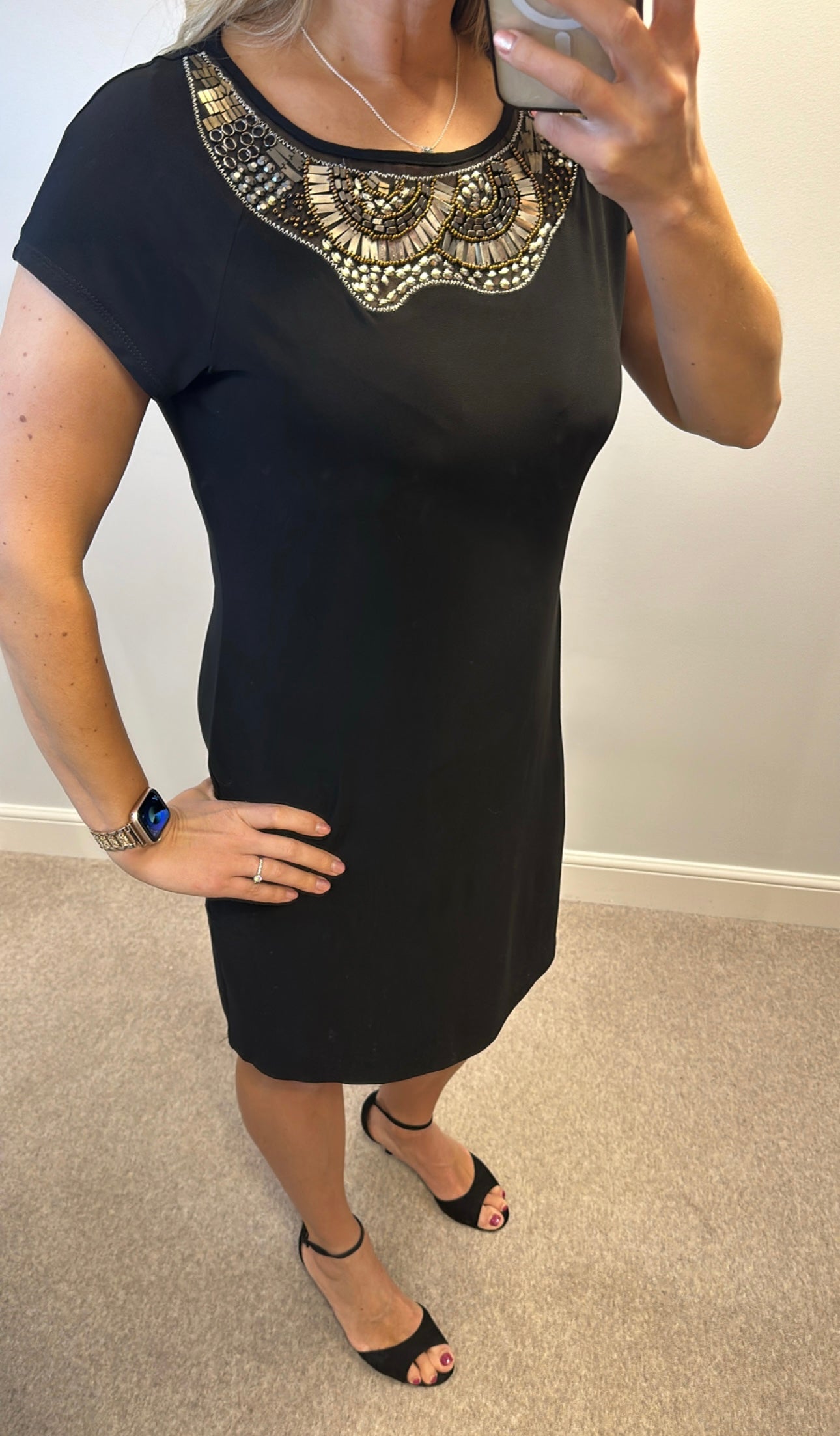 Marina black beaded dress size L would fit upto size 14