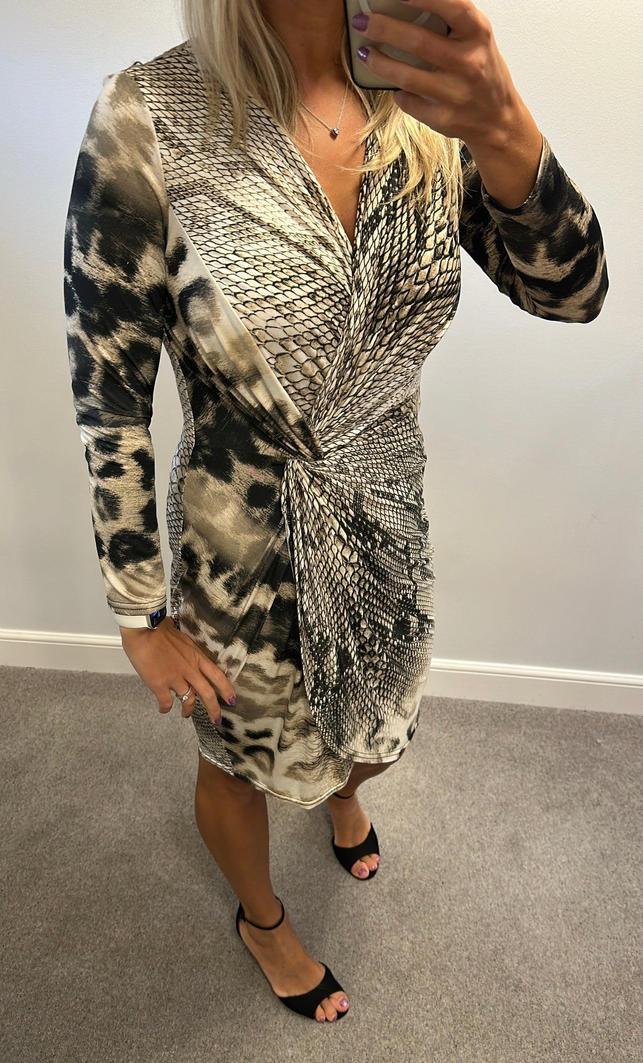 Animal print dress would fit upto size 16