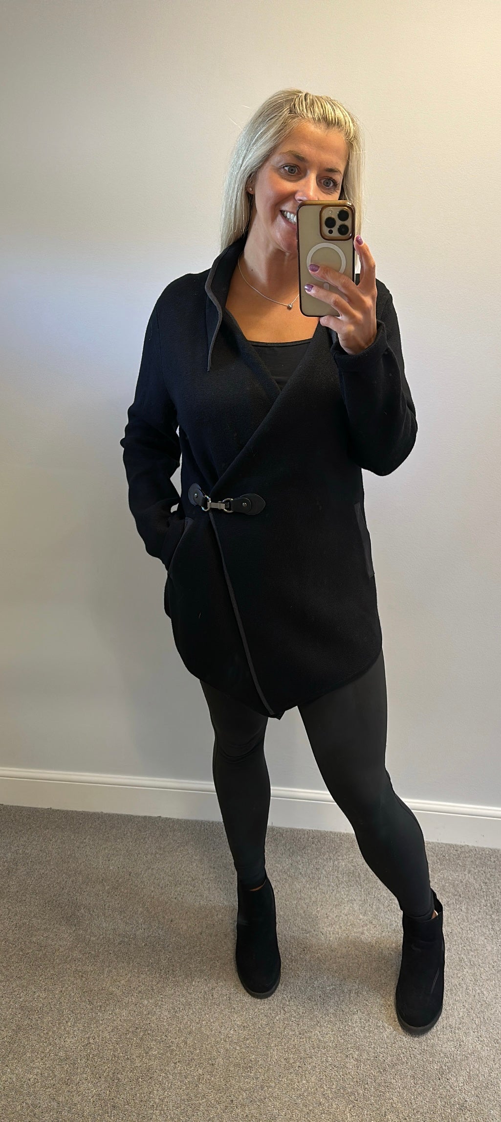 Cristina black top size L/XL would fit upto size 16