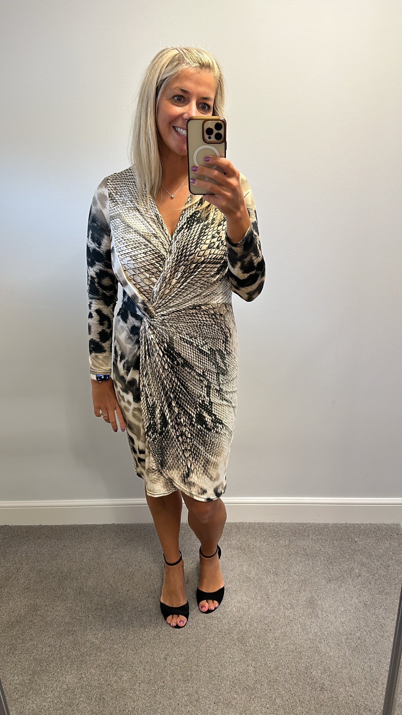 Animal print dress would fit upto size 16