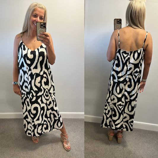 H&M black and white print dress with side split brand new without tags size XL would fit upto size 18