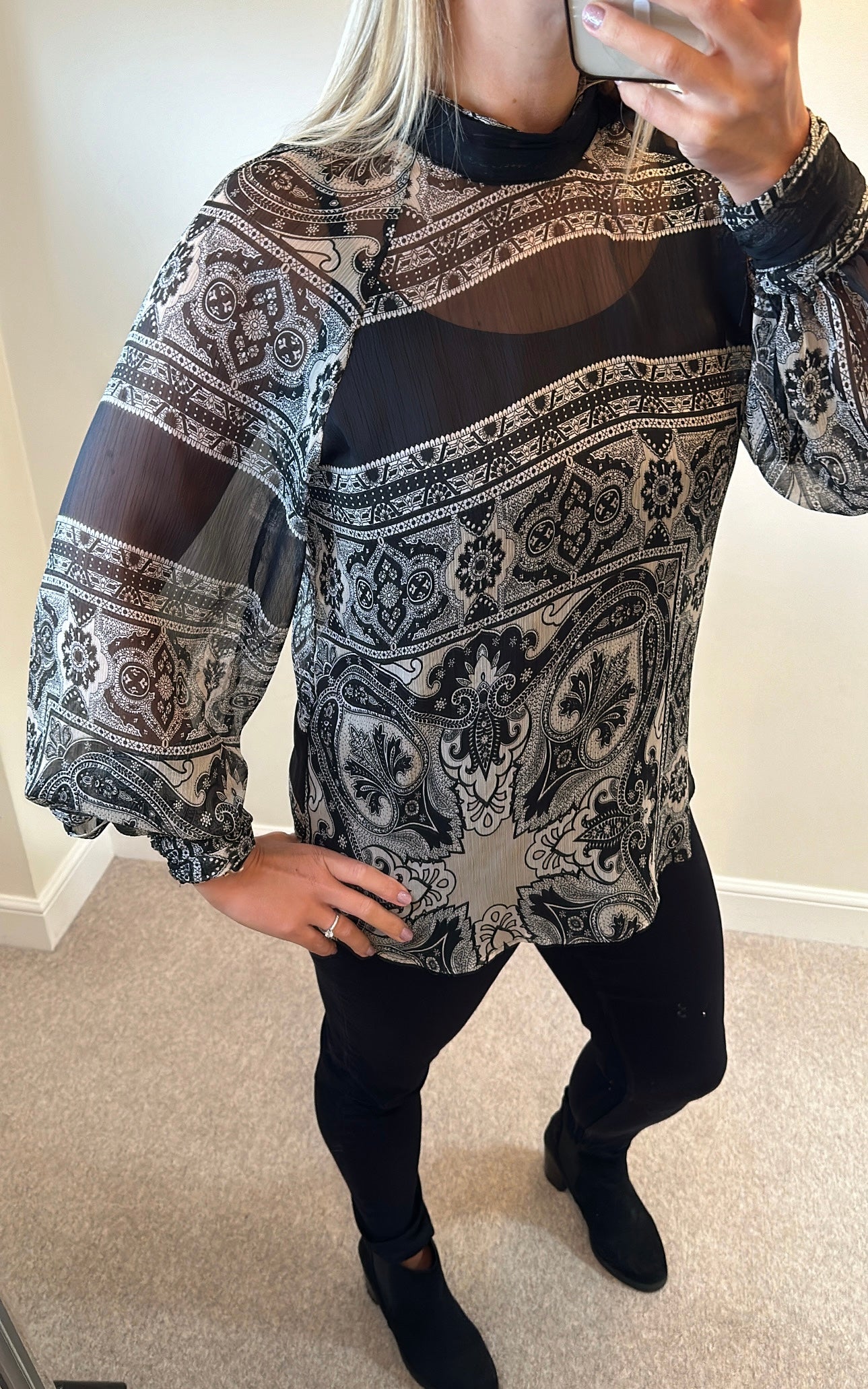 Mango black paisley print blouse would fit upto size 16