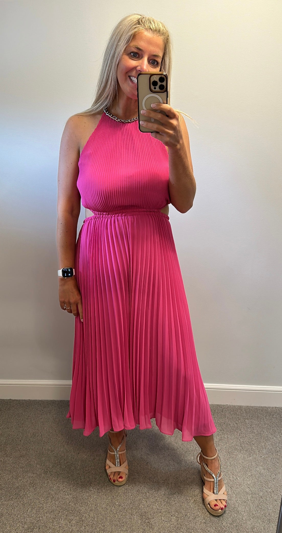 Michael Kors Pleated Cutout Dress in fuchsia pink with a chain-link halter neckline size M fitting upto size 14