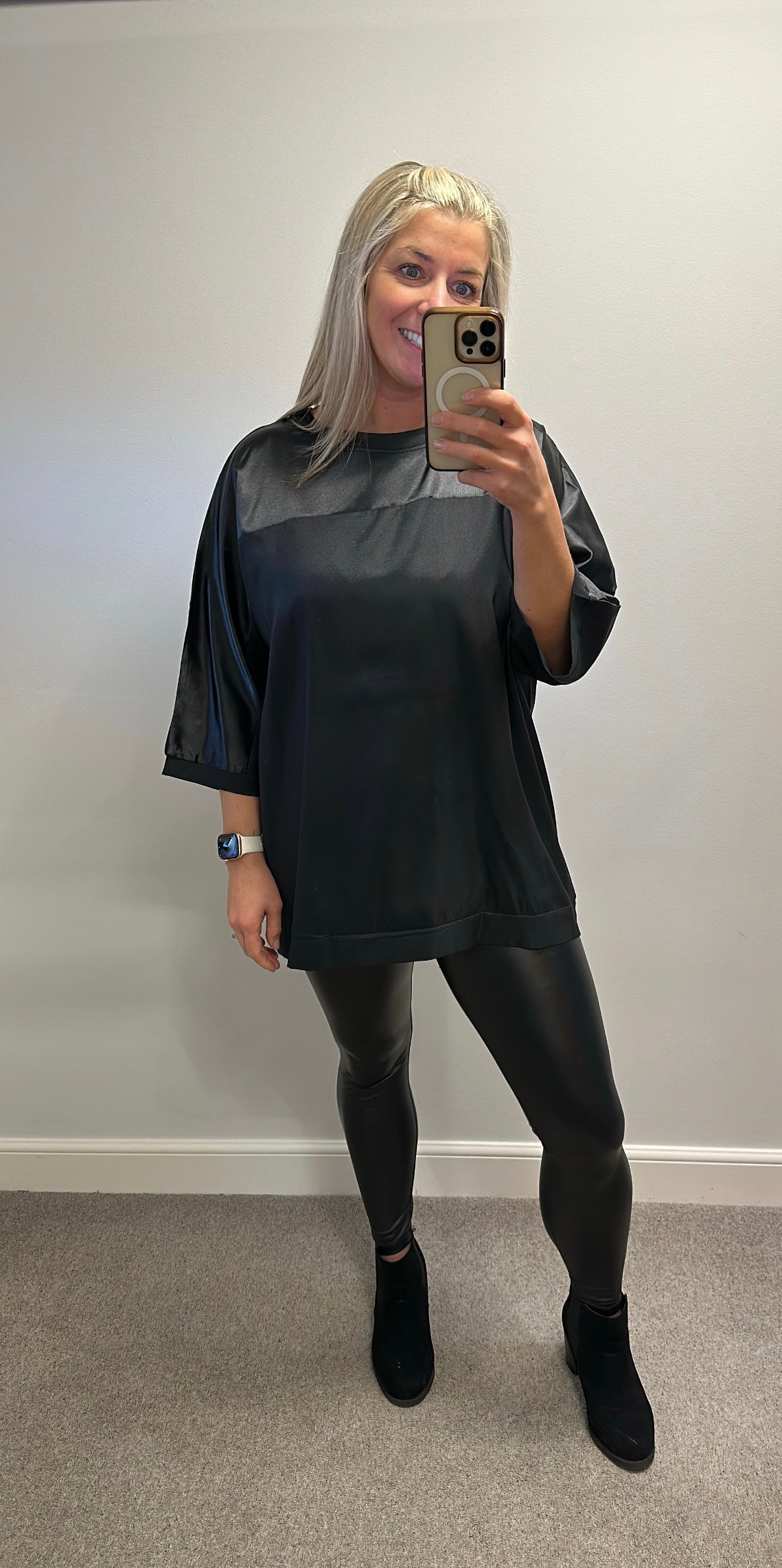 Black top size XL would fit upto size 18