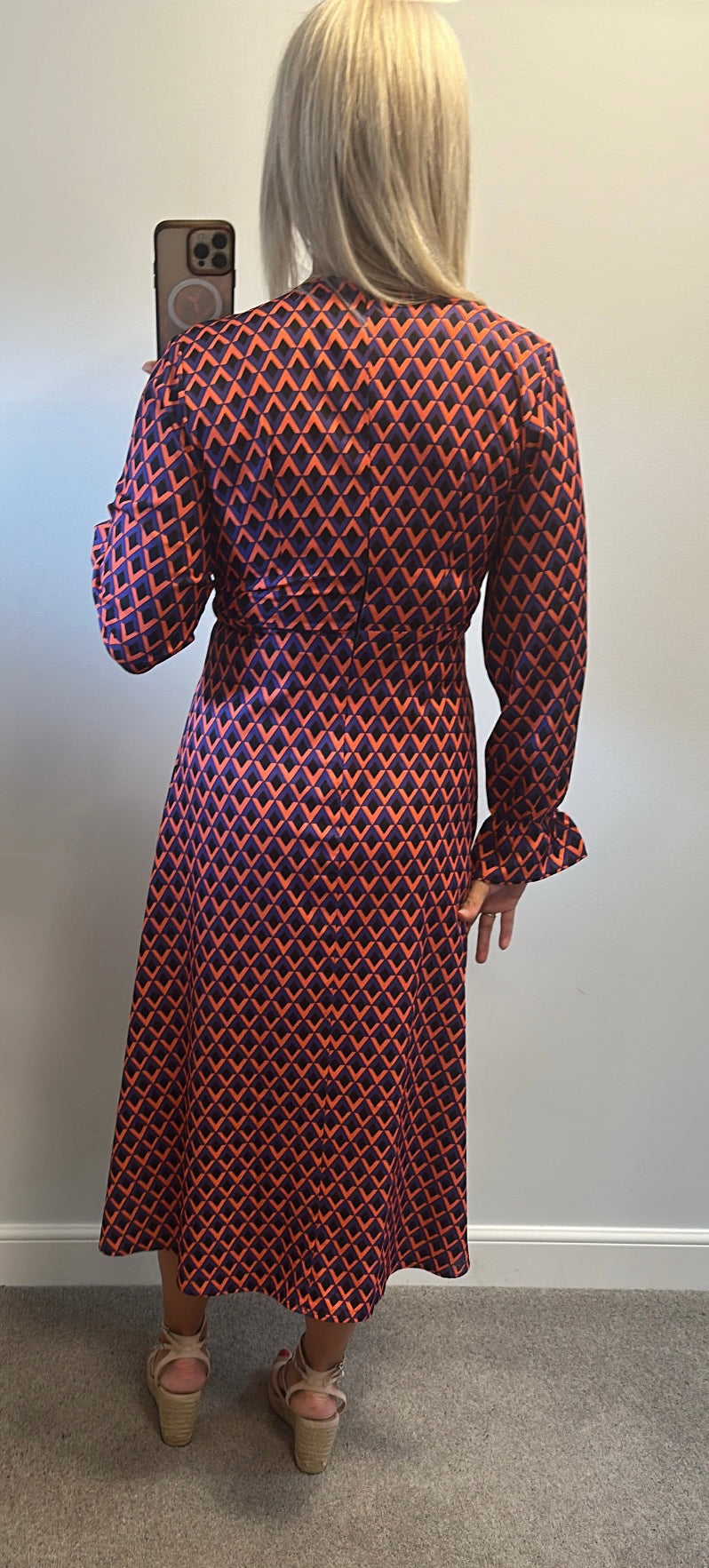Orange and purple print dress would fit up to size 12