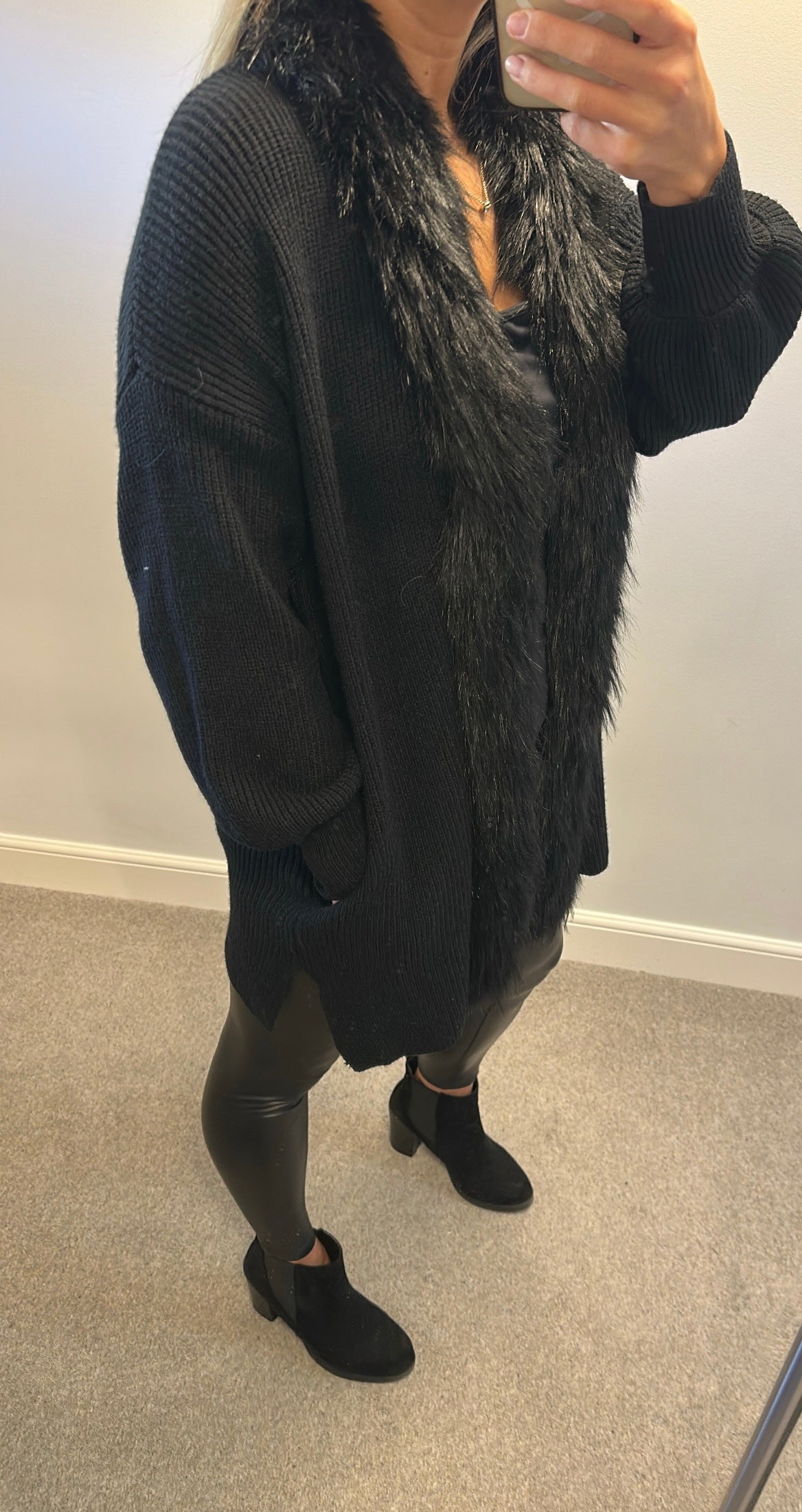 Colynn black faux fur trim knit jumper with pockets one size fitting upto size 16
