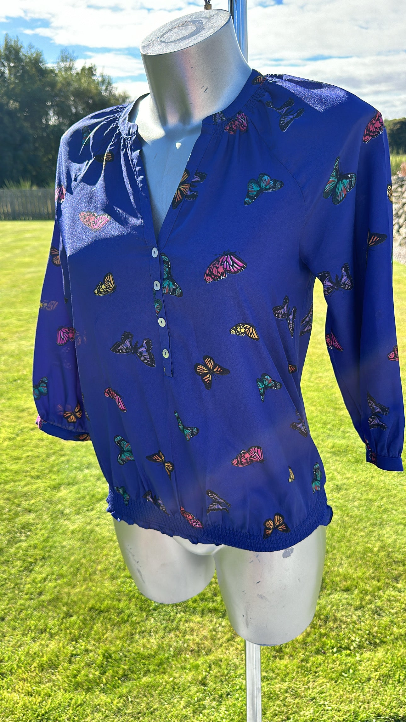 Monsoon blue butterfly top size S would fit upto size 10